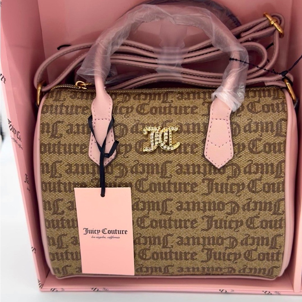 Juicy Couture brown and pink Y2k bag.
Hand bag with crossbody strap.